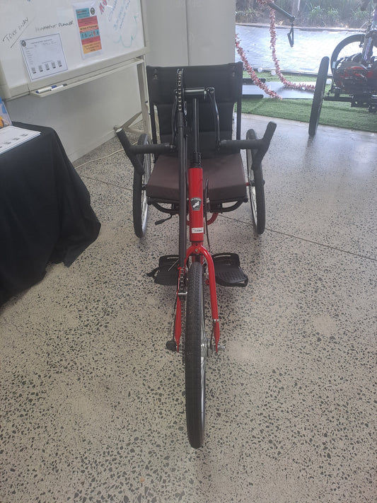 Red rehatri handcycle